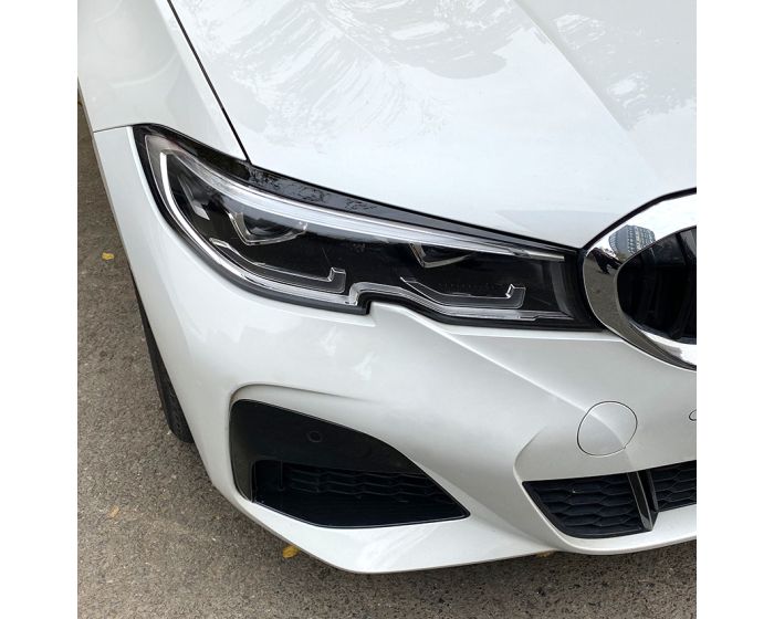 BMW Valoluomet G20 G21 2019–2022 – Kiiltävän musta Evil Eye - BMW Scheinwerferblenden G20 G21 2019–22 – Glänzend Schwarz Böser Blick - BMW Headlight Covers G20 G21 2019–2022 – Gloss Black Evil Eye