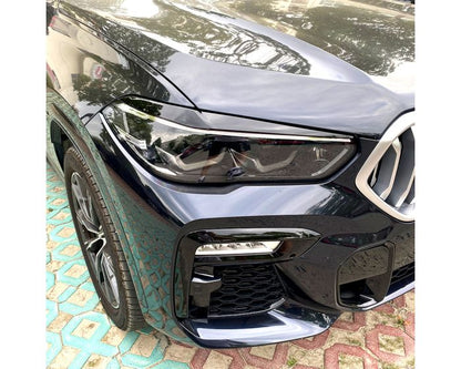 BMW Valoluomet X5 G05 & X6 G06 2018– – Kiiltävän musta. - BMW Headlight Covers X5 G05 & X6 G062018– – Gloss Black Headlight Covers - BMW Scheinwerferblenden X5 G05 G06 2018– – Scheinwerferabdeckungen in Hochglanzschwarz – Glänzend schwarz.